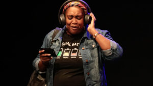 Woman wearing head phones.