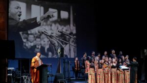 People on a stage celebrating MLK