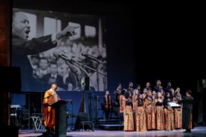 People on a stage celebrating MLK